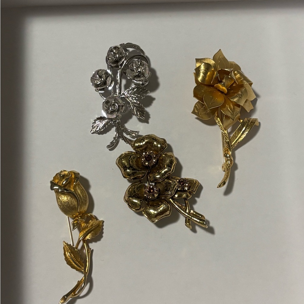 Elegant Gold and Silver Floral Brooch Set